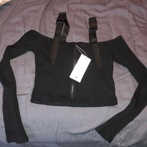 Off shoulder buckle crop top